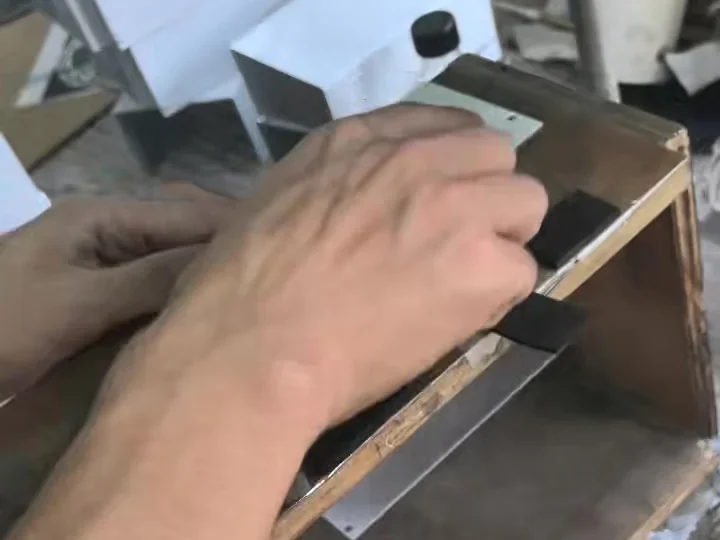 Screen printing operation on sheet metal parts at LIUMAI